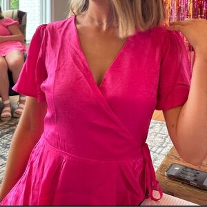 Lulu’s hot pink ruffled dress